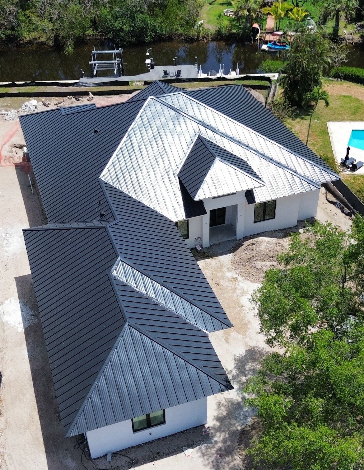 Metal roof on a canal-front home